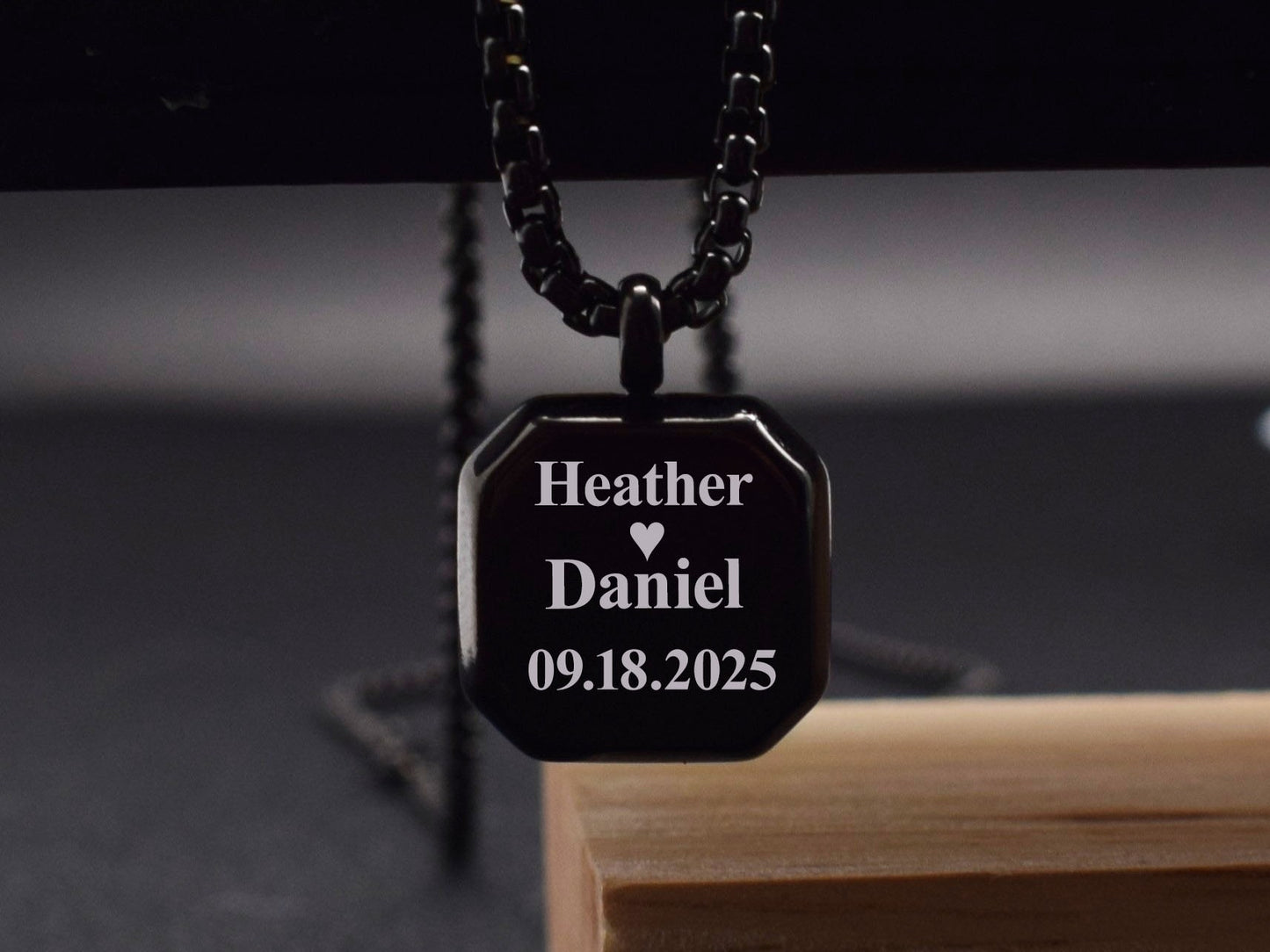 Personalized black anniversary necklace for boyfriend with engraved initials and date