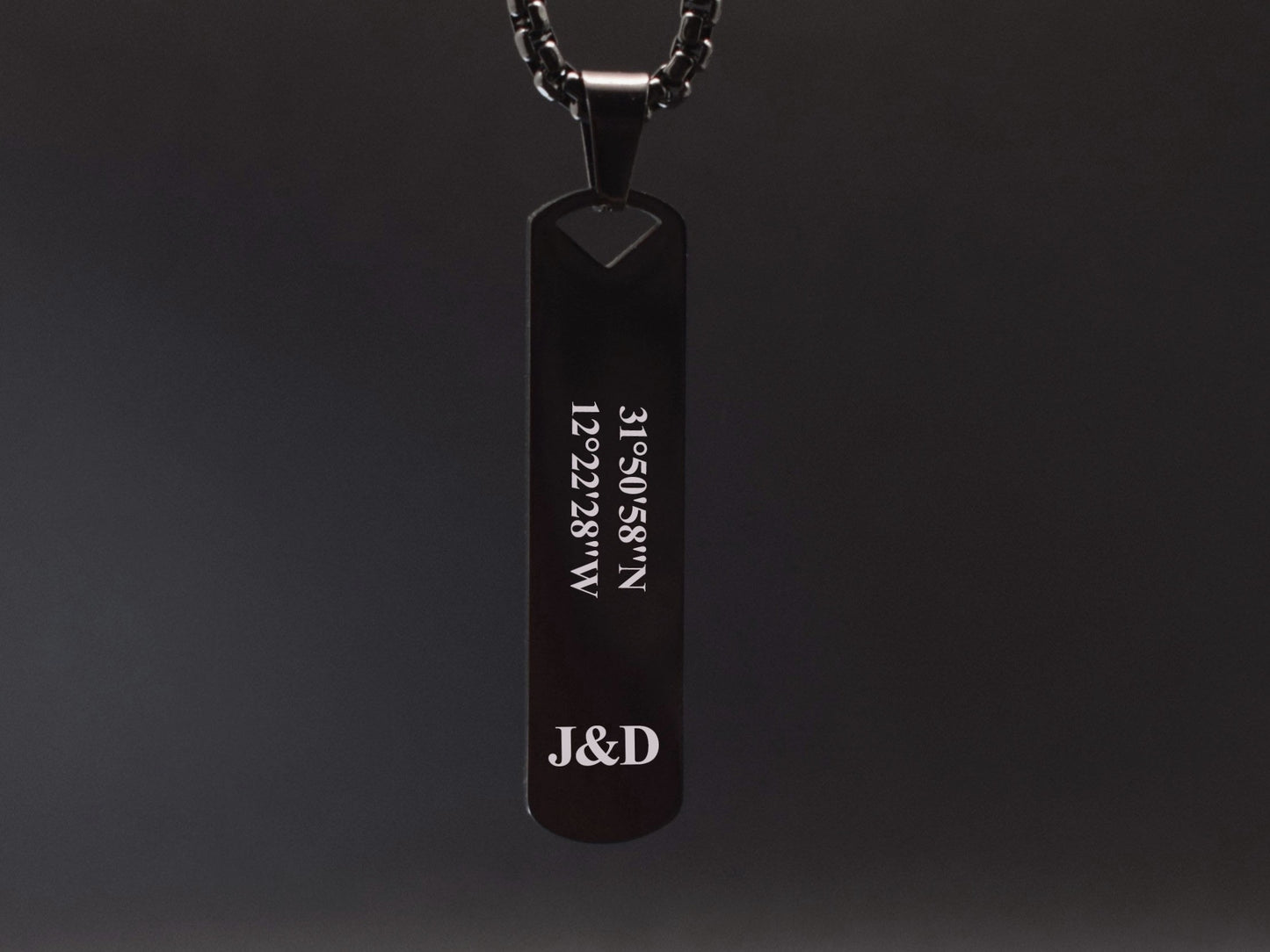 Black pendant necklace with engraved custom coordinate and initials