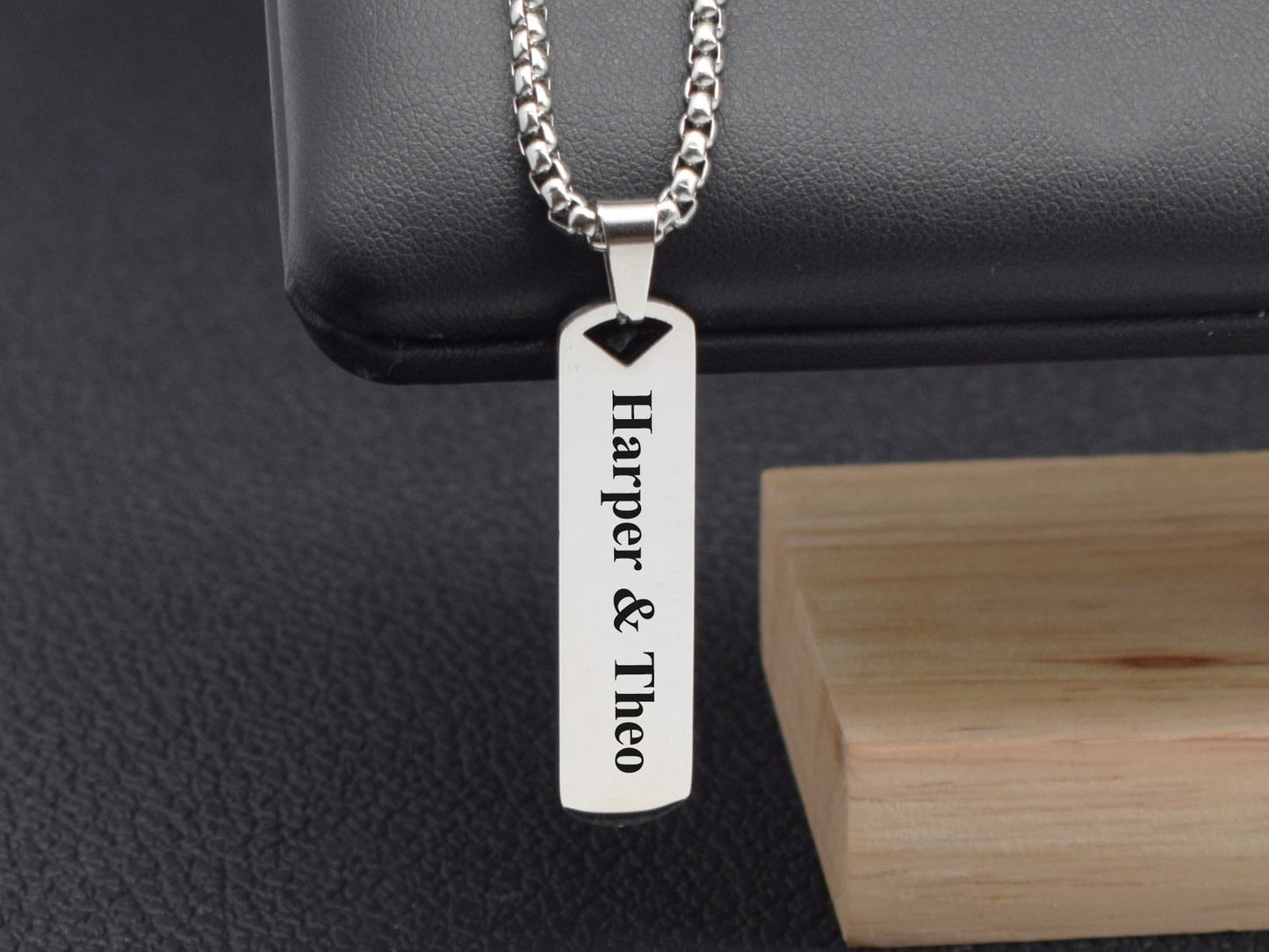 Minimalist stainless steel bar pendant with custom couples name