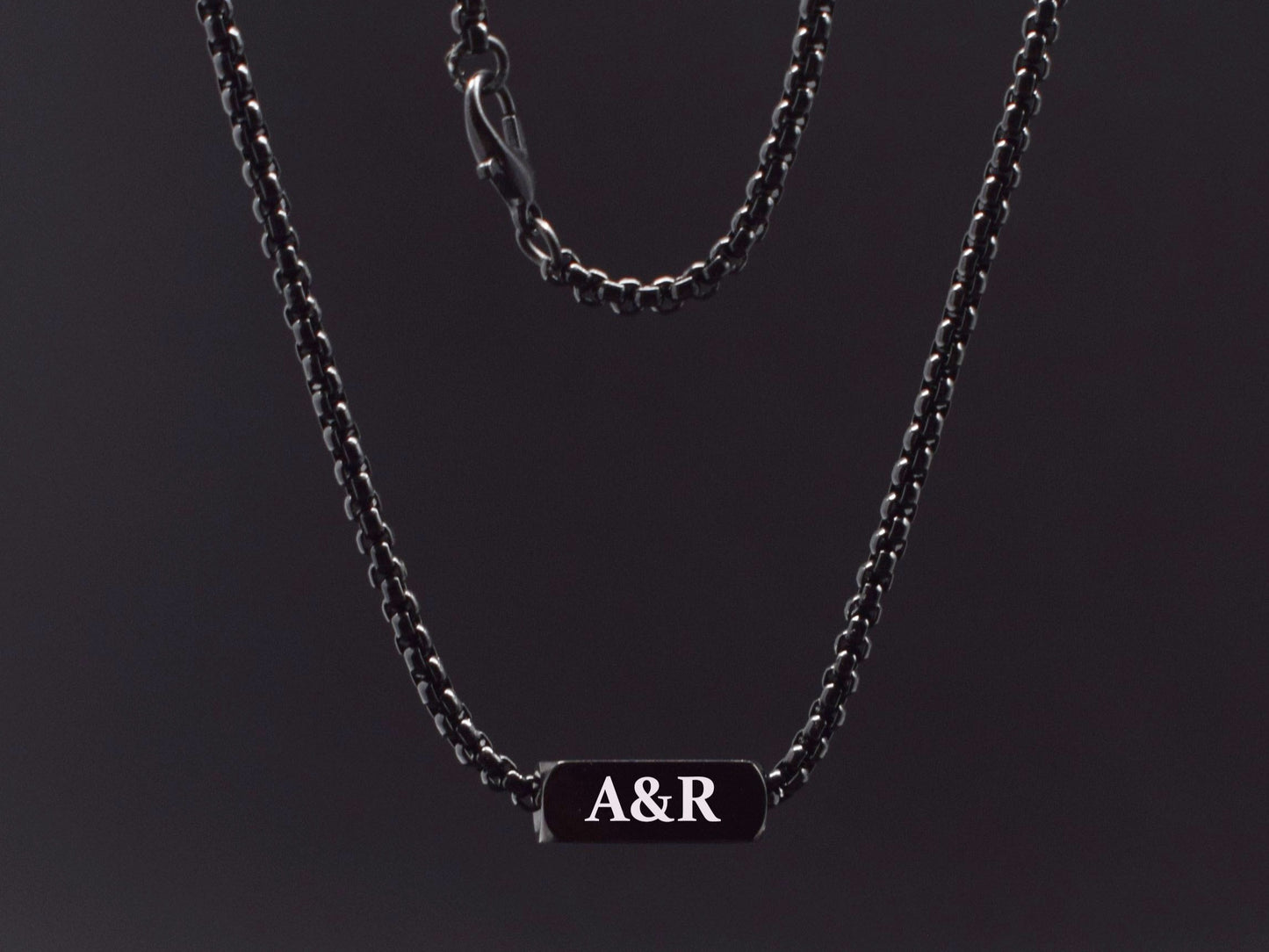 Modern black stainless steel necklace with custom initials