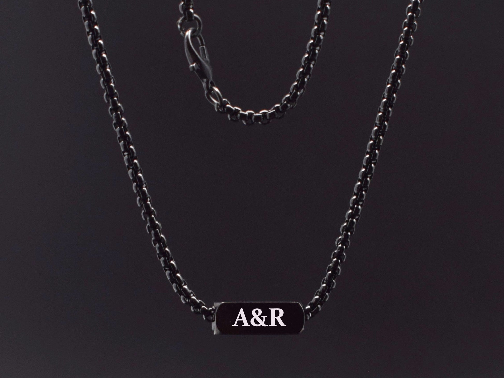Modern black stainless steel necklace with custom initials